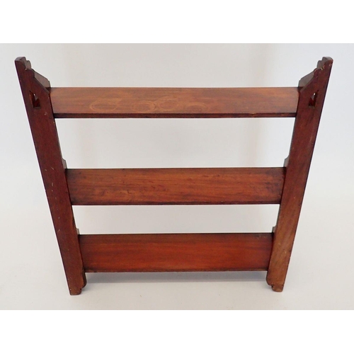 1075 - A Victorian mahogany set of wall shelves with pierced decoration, 56cm wide