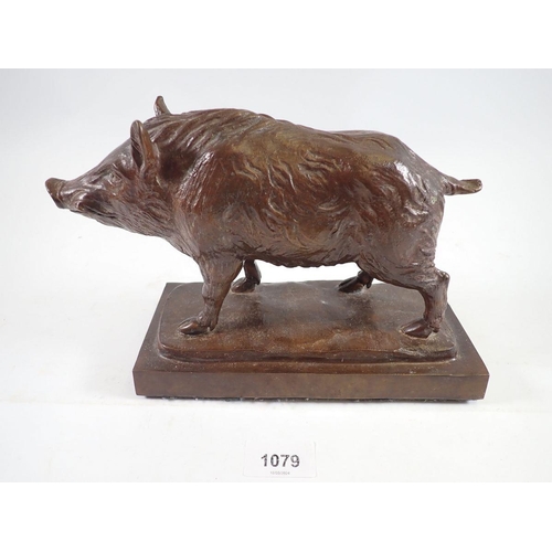 1079 - A bronze wild boar on plinth base, 24cm wide