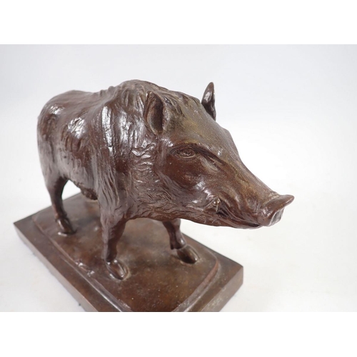 1079 - A bronze wild boar on plinth base, 24cm wide