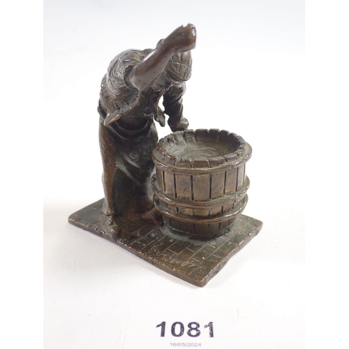 1081 - A small bronze figure of a barrel Cooper at work, 10cm tall signed Butler 77