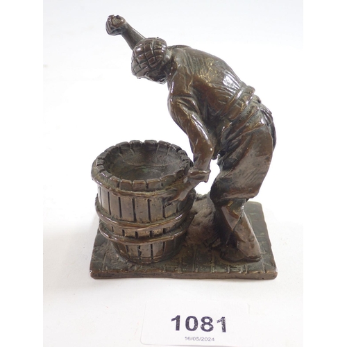 1081 - A small bronze figure of a barrel Cooper at work, 10cm tall signed Butler 77