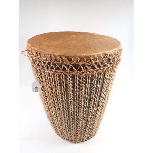 1093 - A tribal skin drum, 37cm tall