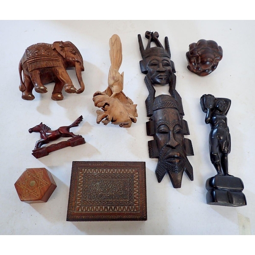 1094 - A collection of woodenware including ethnic hardwood figures, Buddha, card bird, box etc.