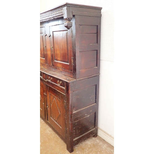 1096 - A 17th century oak court cupboard with two doors over drawers and two panelled cupboards, 140cm wide