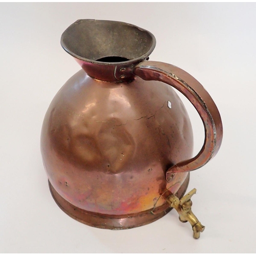 1098 - A large Victorian copper kitchen jug with brass tap fitted under handle, 38cm tall