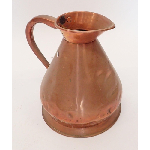 1099 - A Victorian copper flagon, 33cm