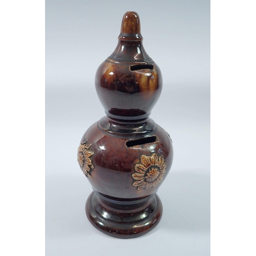 11 - A Victorian treacle glaze double gourd form money box, 20cm tall