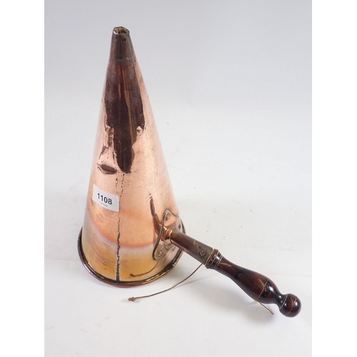 1108 - A Victorian copper ale warmer with turned wooden handle, 29.5cm