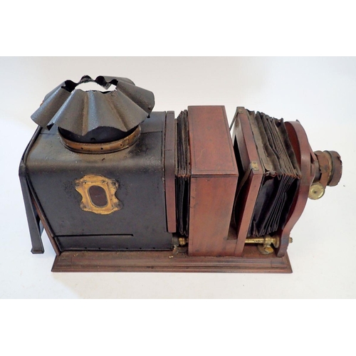 1113 - A Victorian mahogany cased magic lantern