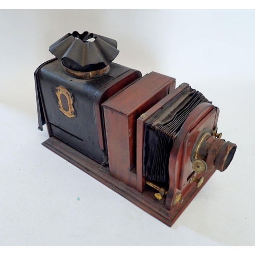 1113 - A Victorian mahogany cased magic lantern