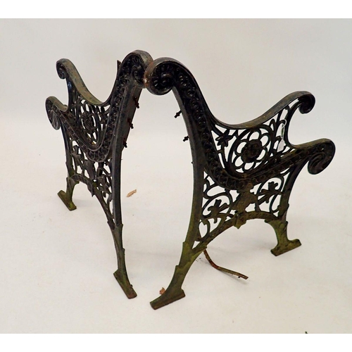 1119 - A pair of Victorian cast iron bench ends