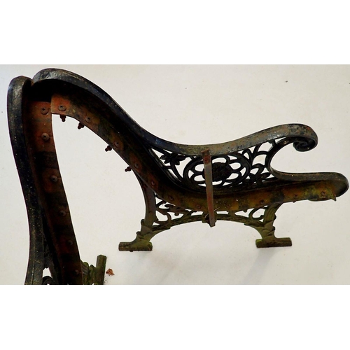 1119 - A pair of Victorian cast iron bench ends