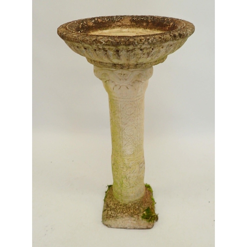 1120 - A reconstituted stoneware bird bath decorated classical maidens 77cm tall, the column older than the... 