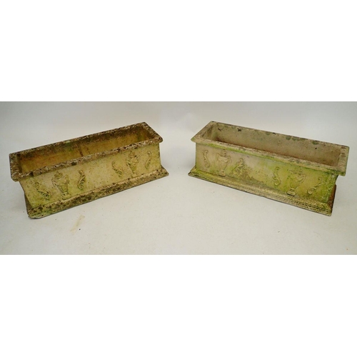 1130 - A pair of reconstituted stone garden troughs decorated classical motifs 63x23cm