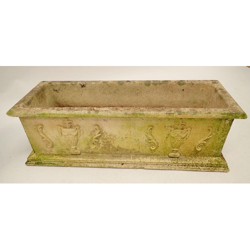 1130 - A pair of reconstituted stone garden troughs decorated classical motifs 63x23cm