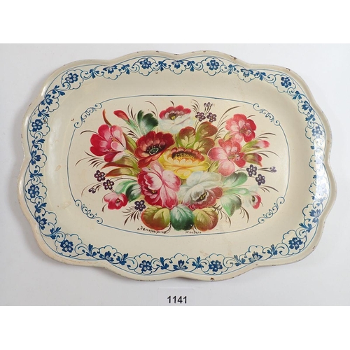 1141 - A Russian floral painted metal tray, 33cm wide