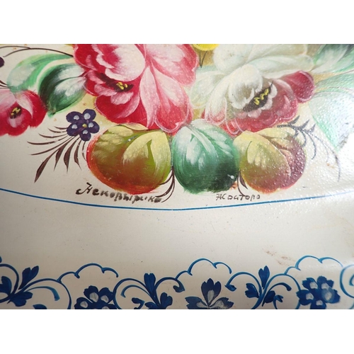 1141 - A Russian floral painted metal tray, 33cm wide