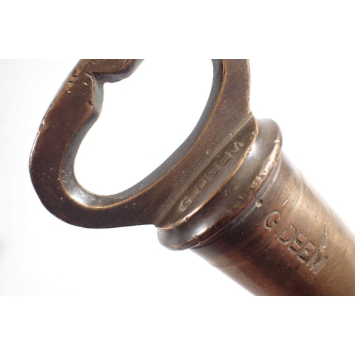 1150 - A 19th century brass barrel tap, stamped G Deem, Martineau & Smith, 25cm long