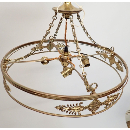 1152 - An Edwardian gilt metal circlular neo-classical light fitting with anthemion motif, lacking original... 