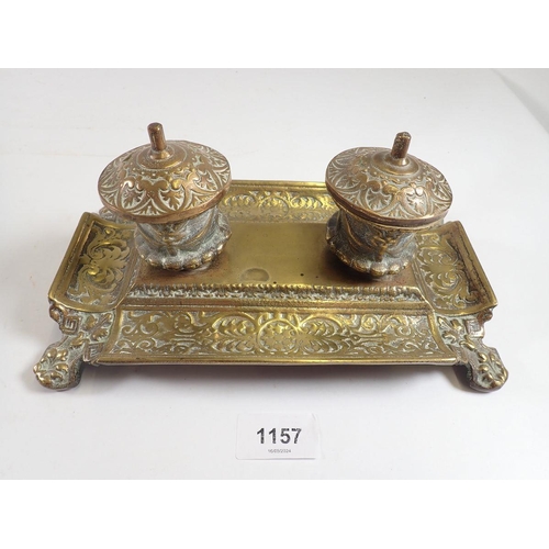 1157 - A cast brass inkstand with strapwork decoration, 24cm wide