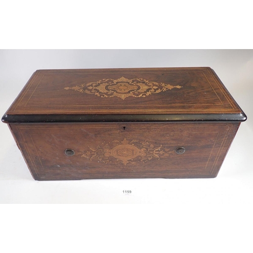 1159 - A Swiss musical box in marquetry case with cylinder movement playing six airs, 48cm wide