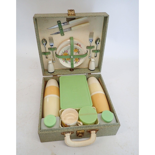 1167 - A 1950's Brexton picnic set with china daffodil pattern cups, saucers and cake plates, cutlery etc. ... 