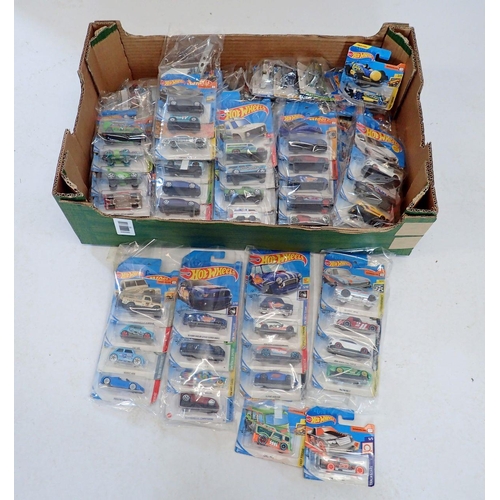 1245 - A box of Hot Wheels vehicles, all unopened in original packaging - over 70