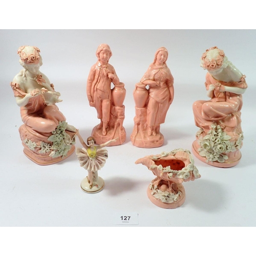 127 - A pair of continental pink ceramic figures with white floral detailing, two similar pink figures etc... 