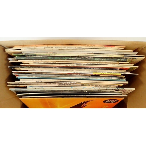 1276 - A box of various 1970's records including children's, folk, world music etc