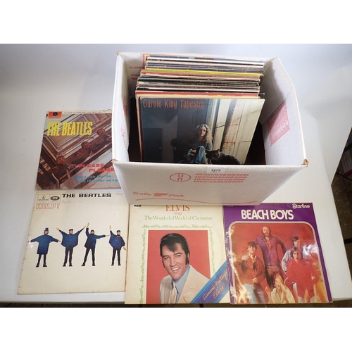 1279 - A box of records including The Beatles, Elvis, Dolly Parton and a wide selection of other genres