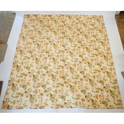 1306 - A late Victorian hand stitched Durham quilt with floral yellow and green fabric and plain gold fabri... 