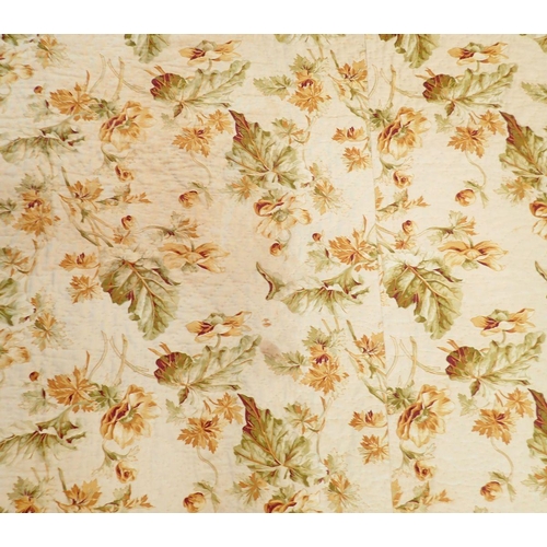 1306 - A late Victorian hand stitched Durham quilt with floral yellow and green fabric and plain gold fabri... 