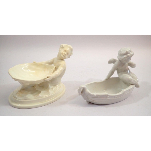 131 - A Wedgwood white porcelain cherub and shell dish, a/f and a cherub and boat