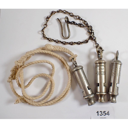 1354 - An Adie Bros WWII military whistle, an ARP whistle and a Metropolitan whistle