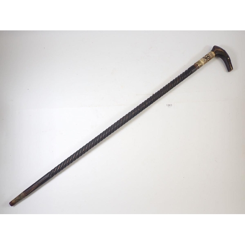 1363 - An ebonised sword stick with bone inlay