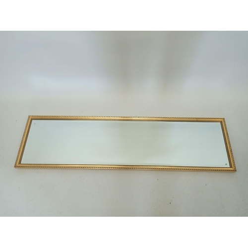 1371 - A full length gilt framed mirror, 34.5 x 124.5cm