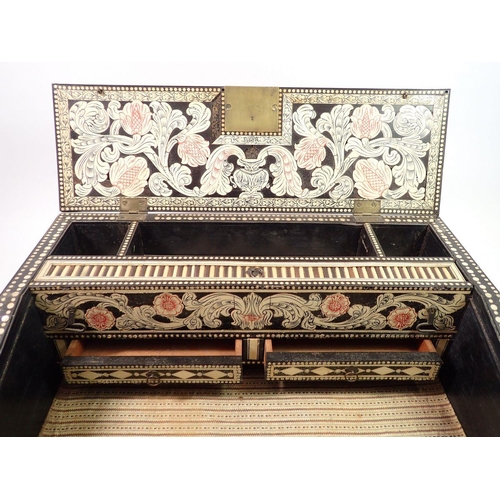 1376 - A 19th century Anglo Indian porcupine quill writing slope, the fully fitted interior with red and bl... 