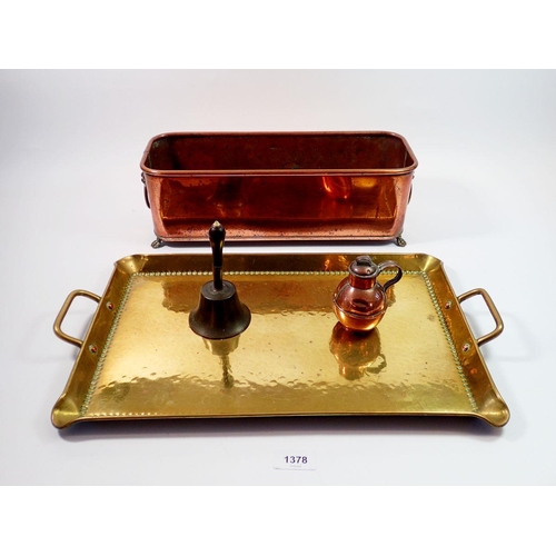 1378 - A copper plant trough 38cm long, a brass hammered tray, a miniature gurnsey and a brass bell