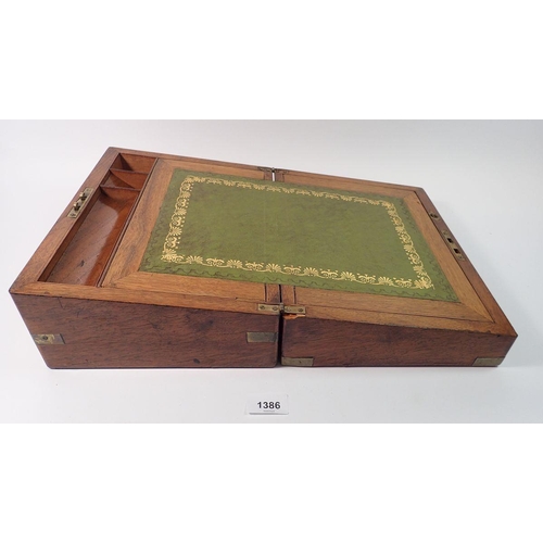 1386 - A Victorian mahogany and brass bound writing slope with fitted interior, 30cm wide