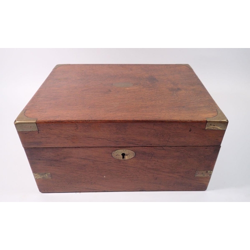 1386 - A Victorian mahogany and brass bound writing slope with fitted interior, 30cm wide