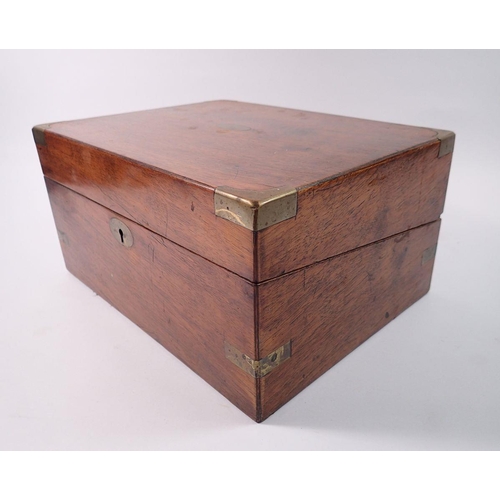 1386 - A Victorian mahogany and brass bound writing slope with fitted interior, 30cm wide