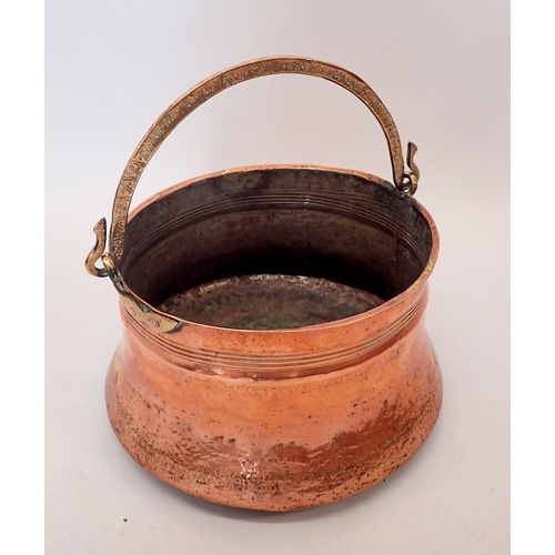 1386A - A 19th century large copper coal bucket with swing handle, 36cm diameter