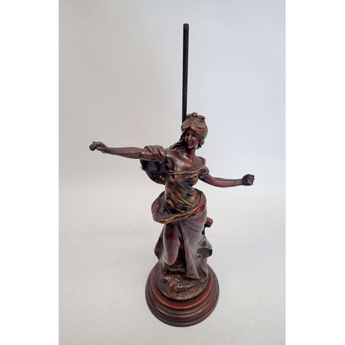 1392 - A bronze lamp base figure of a woman after Auguste Moreau (now lacking lamp fitting) 56cm tall,