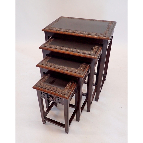 1393 - A nest of four carved hardwood occasional tables, 51 x 36 x 63cm