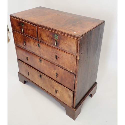 1398 - A George II walnut chest of two short and three long drawers on bracket supports, 86cm