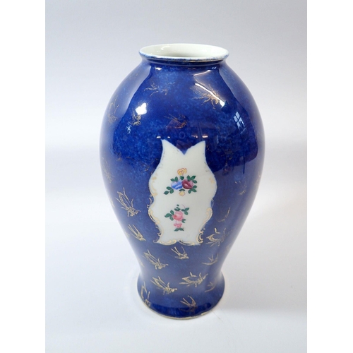 14 - A blue and gold Worcester style vase with floral relief panels, base marked 877/4527, 27cm tall