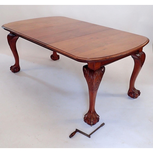 1400 - A Victorian mahogany windout dining table and two interleaves all on cabriole, claw and ball support... 