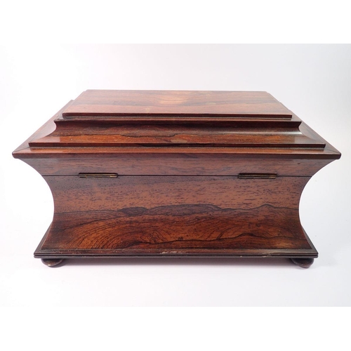 1416 - A Victorian rosewood sarcophagus form tea caddy with fitted interior but no bowl, 37cm wide