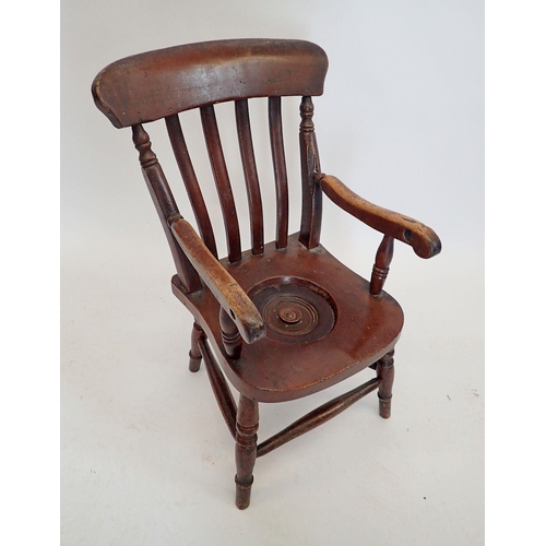 1433 - A Victorian Childs potty chair with slat back