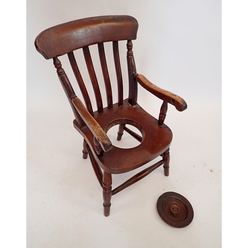 1433 - A Victorian Childs potty chair with slat back